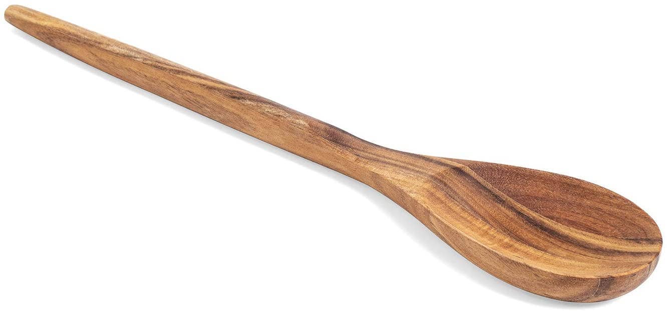 Wooden spoon with a striped pattern on a white background