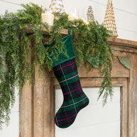 Green Tartan Stocking trees and cedar garland. 