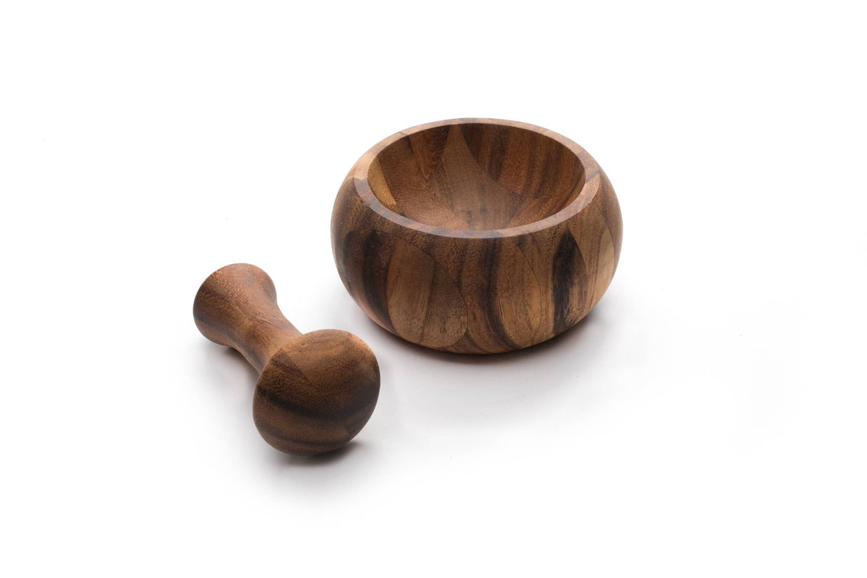 Wooden mortar and pestle on a white background