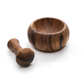 Wooden mortar and pestle on a white background