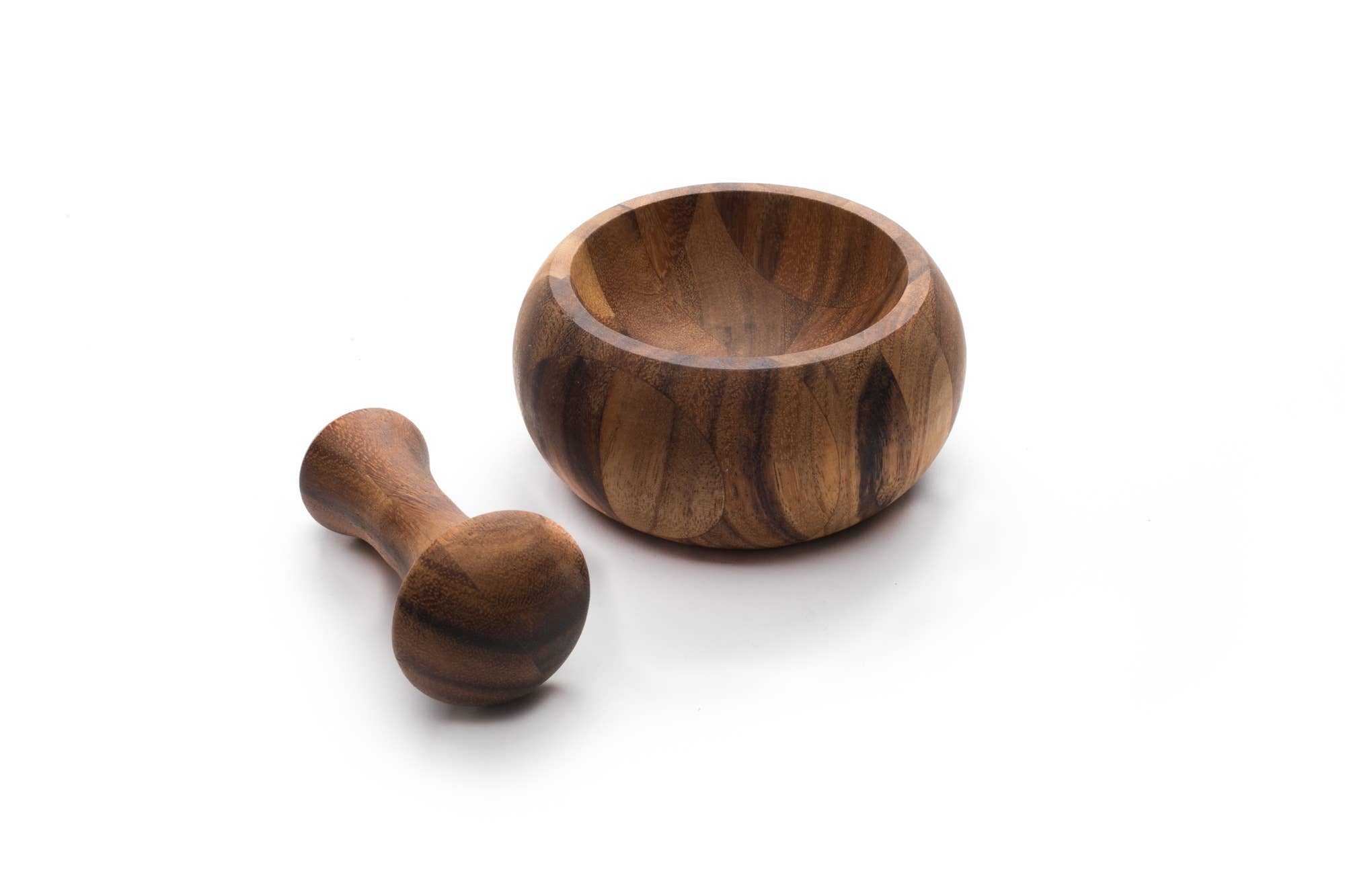 Wooden mortar and pestle on a white background