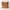 Brown velvet pillow with frayed edges on a white background