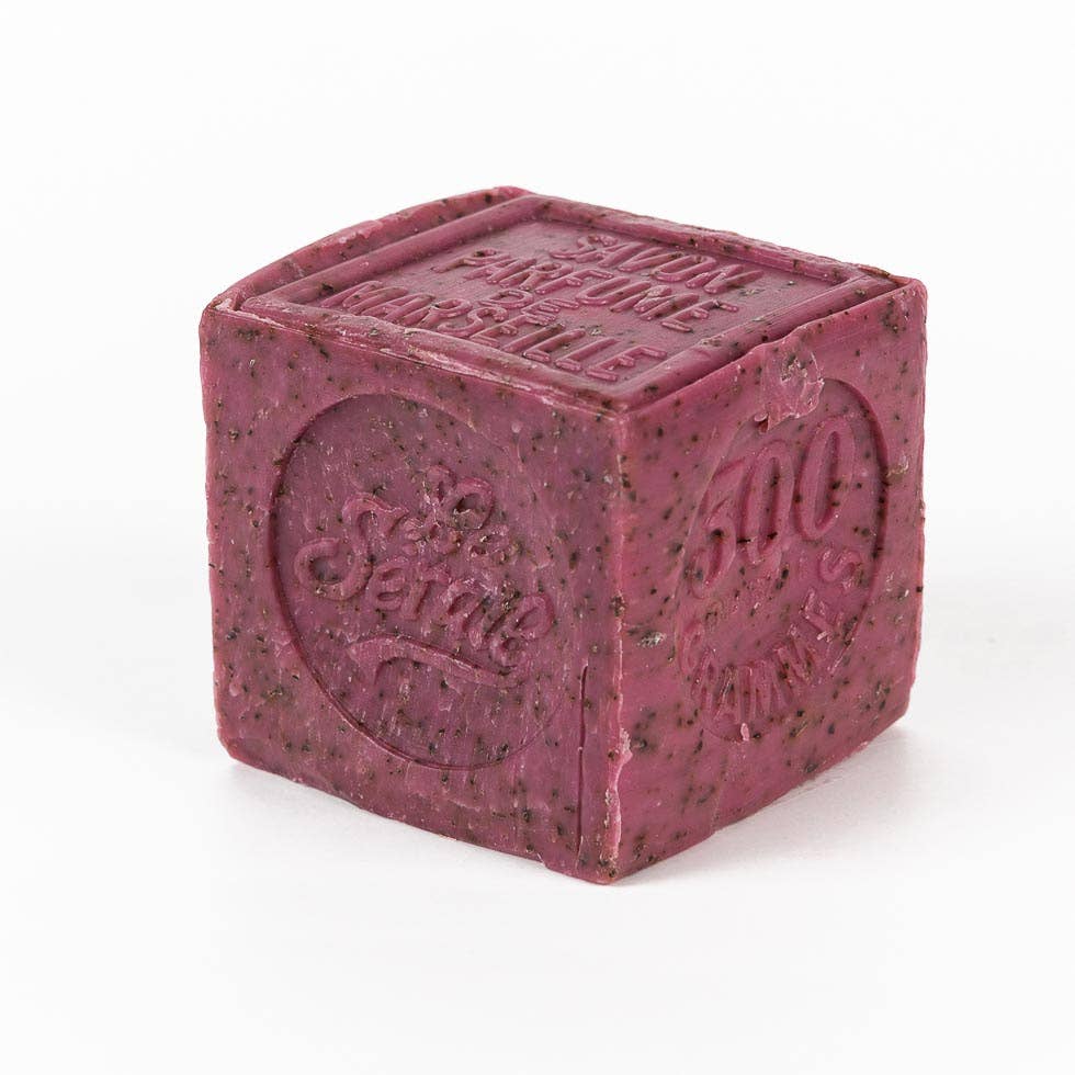 Grape vine Purple cube-shaped soap with branding on a white background.