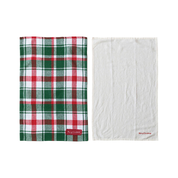 Two plaid blankets, one green and red plaid and one white, on a white background.