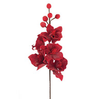 Red artificial flower arrangement on a white background