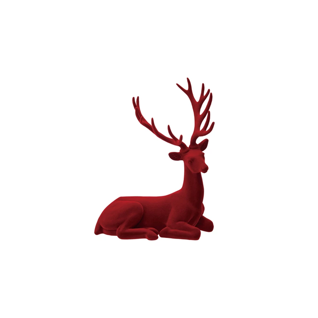 Red deer figurine on a white background