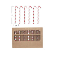 Red and white striped straws with a cardboard box on a white background