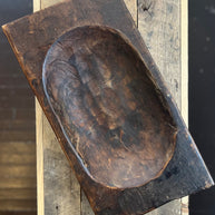 Vintage wooden mold on a wooden surface