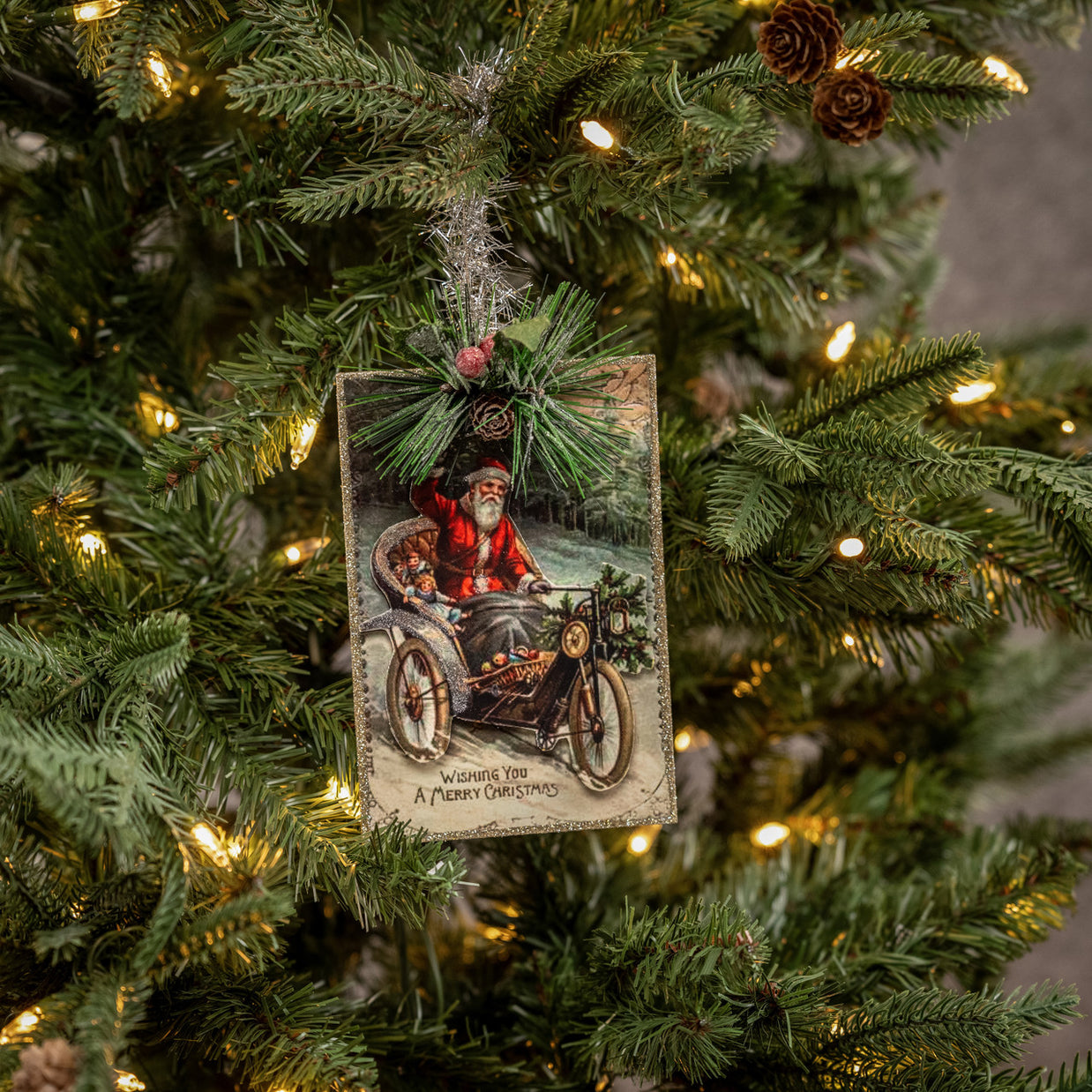 Decorative Christmas ornament with Santa Claus on a tree