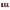 Three fabric stockings in green, red, and green with cutlery, on a white background.
