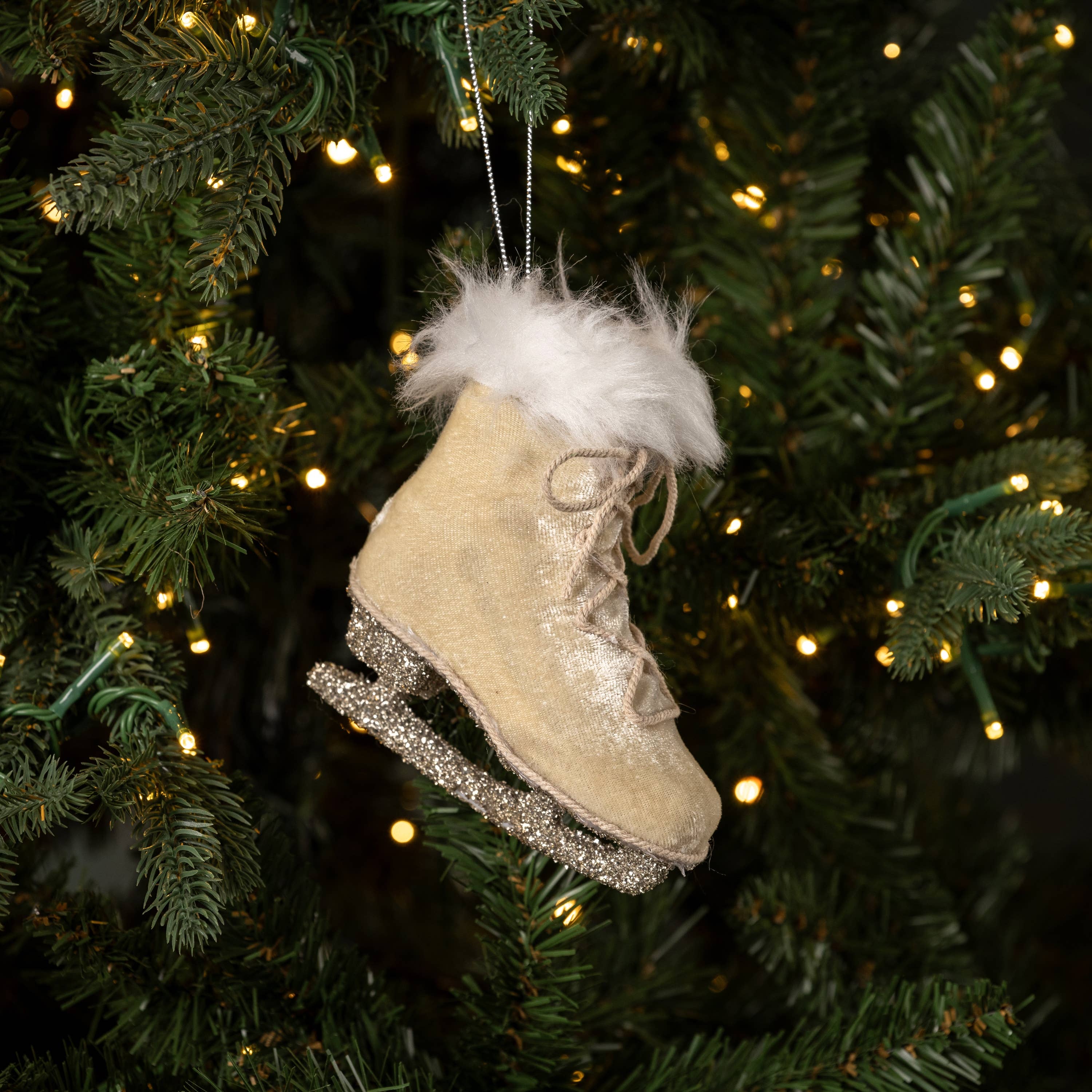 Oatmeal Colored Ice Skate ornament on a tree. 