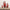Set of Santa Claus figurines with decorative elements on a wooden surface.