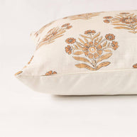 Decorative pillow with floral pattern on a white background