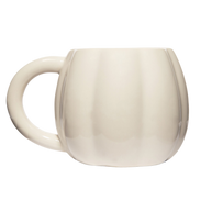 Beige ceramic mug on a white background