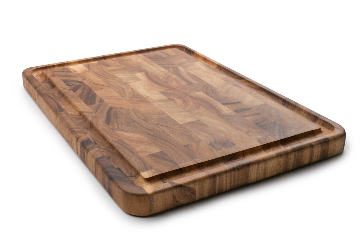 Wooden cutting board with a smooth finish on a white background