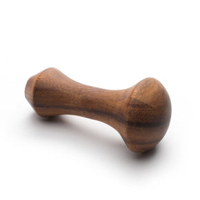 Wooden dog toy on a white background