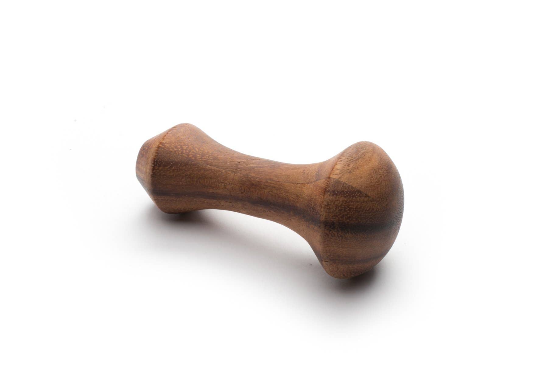 Wooden dog toy on a white background