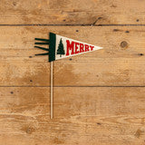 Decorative Christmas flag with 'Merry' text on a wooden background