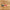 Small pennant flag with 'Merry' text on a wooden surface