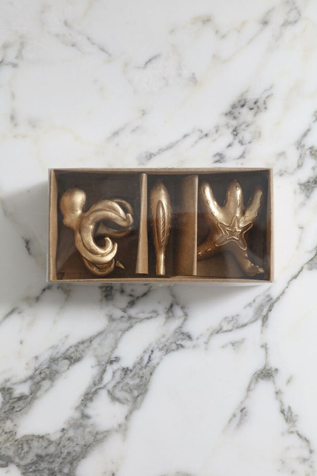 Collection of three sea creature plant sticks.